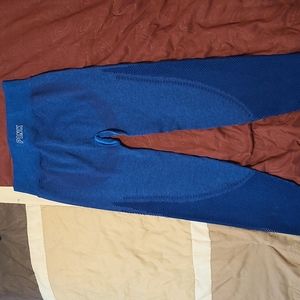 Pink active leggings in blue.